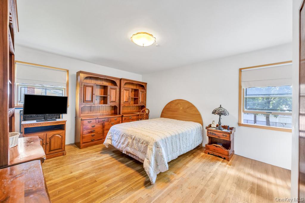196 Haypath Road Old Bethpage, NY 11804 - Photo 13 of 21 Bedroom featuring light wood-style flooring