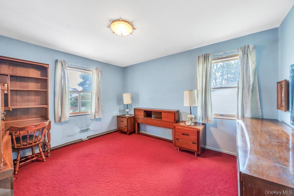 196 Haypath Road Old Bethpage, NY 11804 - Photo 15 of 21 Carpeted home office featuring baseboards