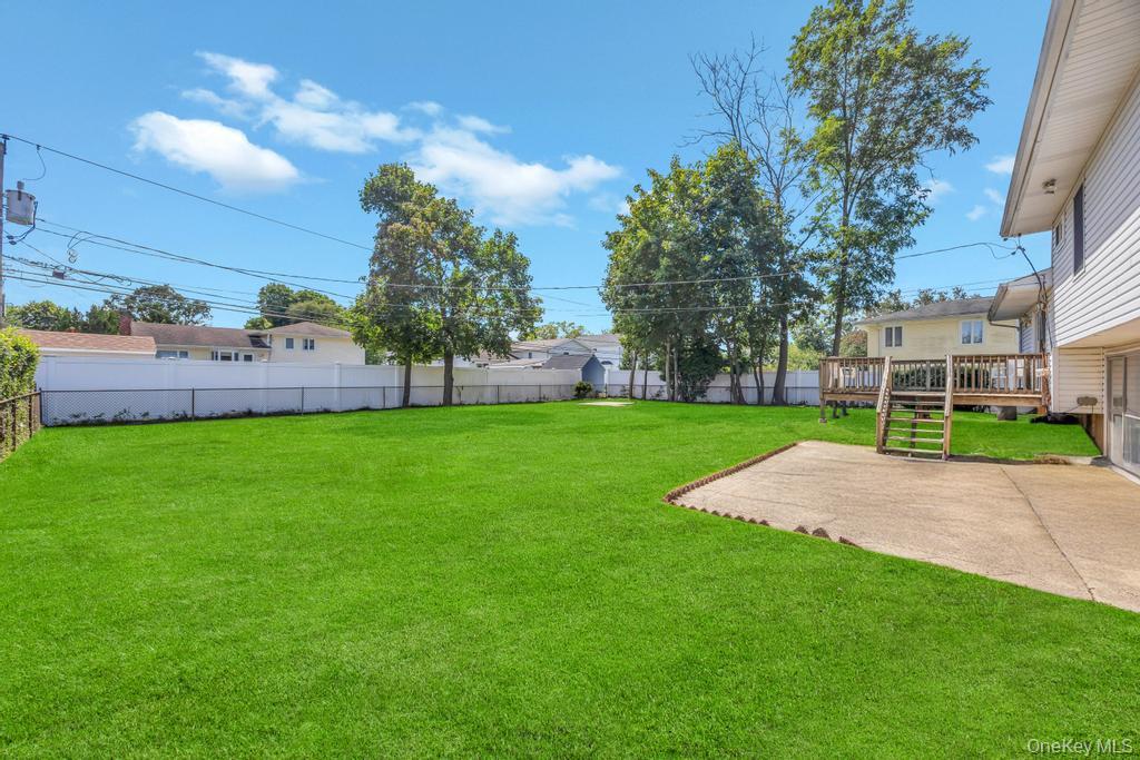 196 Haypath Road Old Bethpage, NY 11804 - Photo 19 of 21 Fenced backyard featuring a wooden deck