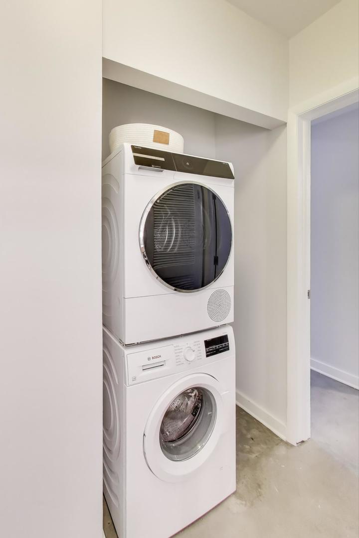 1323 West Belden Avenue, Unit E1 Chicago, IL 60614 - Photo 17 of 23 a utility room with dryer and washer