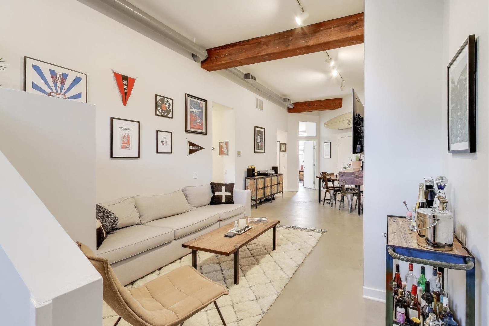 1323 West Belden Avenue, Unit E1 Chicago, IL 60614 - Photo 3 of 23 a living room with furniture and wooden floor