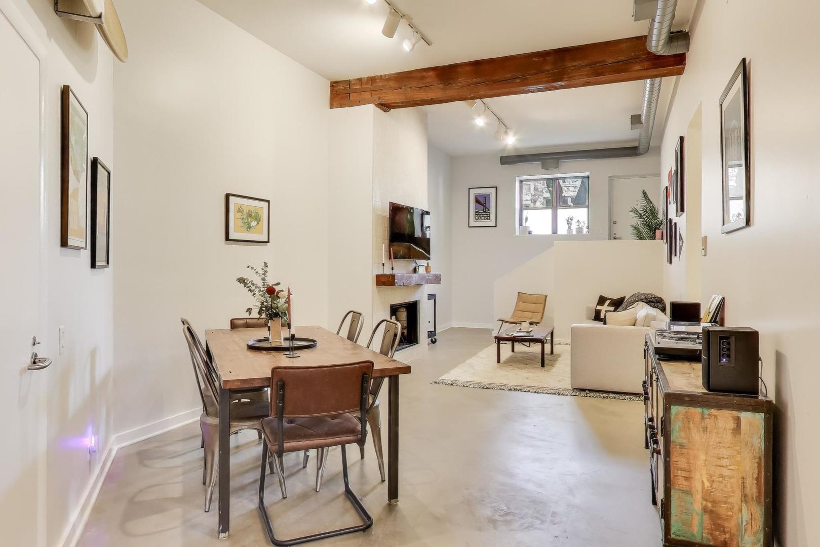 1323 West Belden Avenue, Unit E1 Chicago, IL 60614 - Photo 6 of 23 a dining room with furniture and window