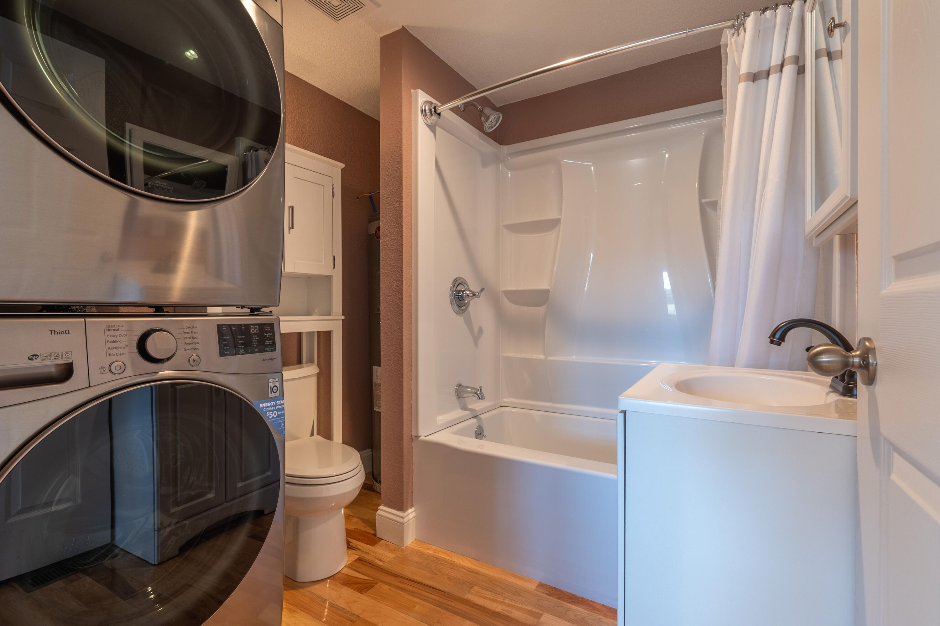 225 Mill Run Road Southwest Floyd, VA 24091 - Photo 23 of 46 a bathroom with a granite countertop sink a toilet and shower
