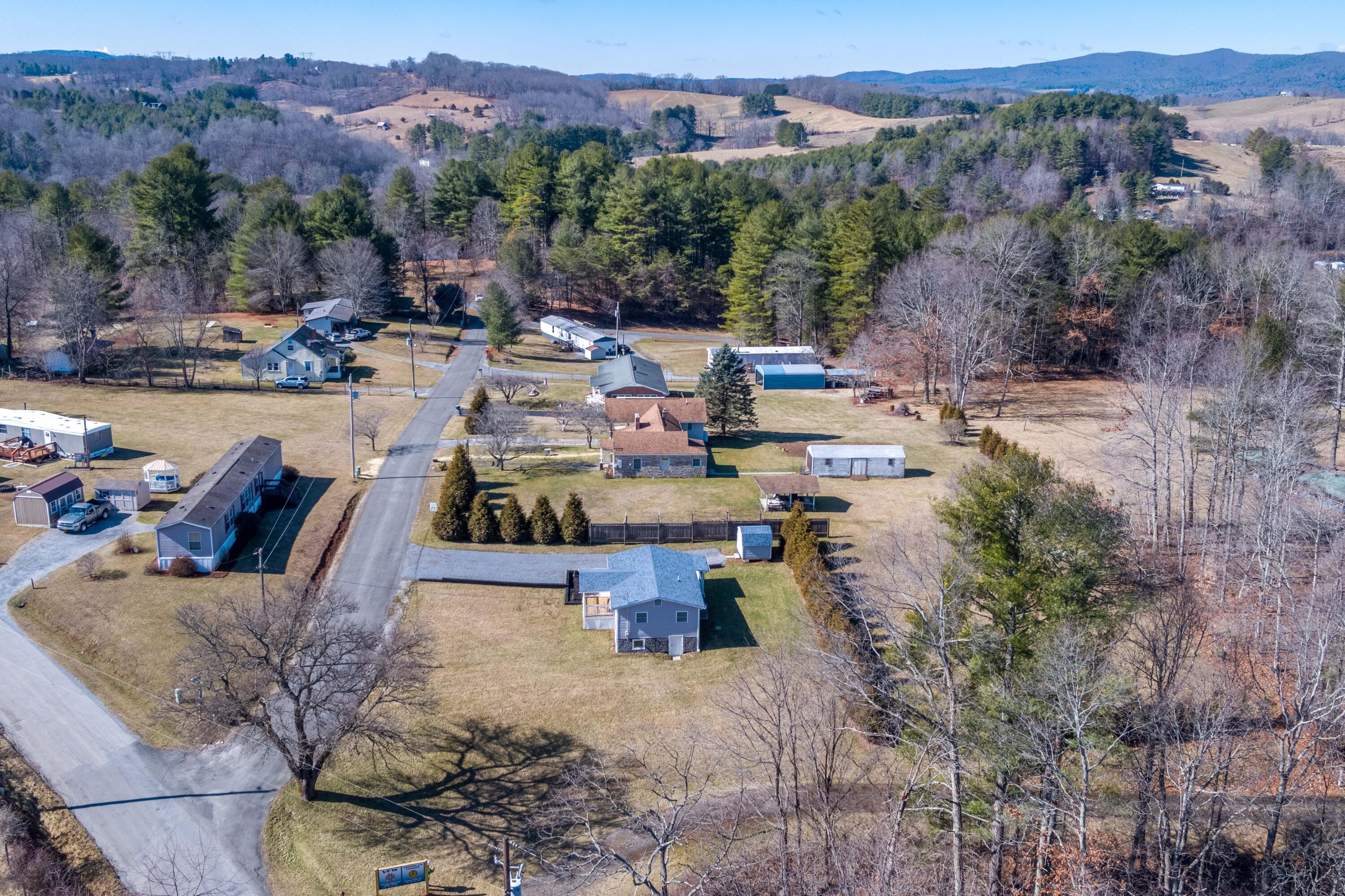 225 Mill Run Road Southwest Floyd, VA 24091 - Photo 44 of 46 aerial view of a house with a yard and a large tree