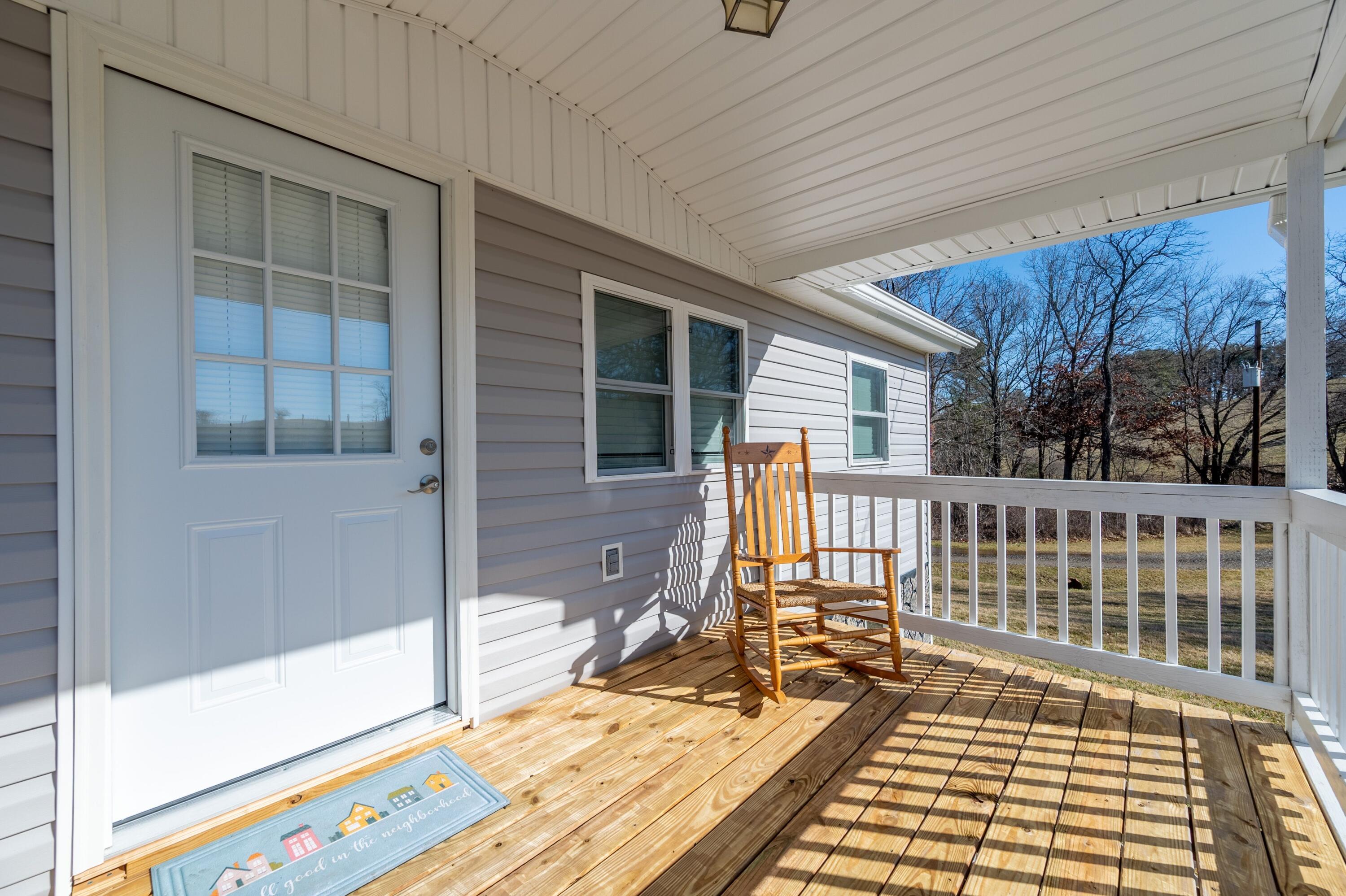 225 Mill Run Road Southwest Floyd, VA 24091 - Photo 5 of 46 a view of balcony with wooden floor and wooden fence