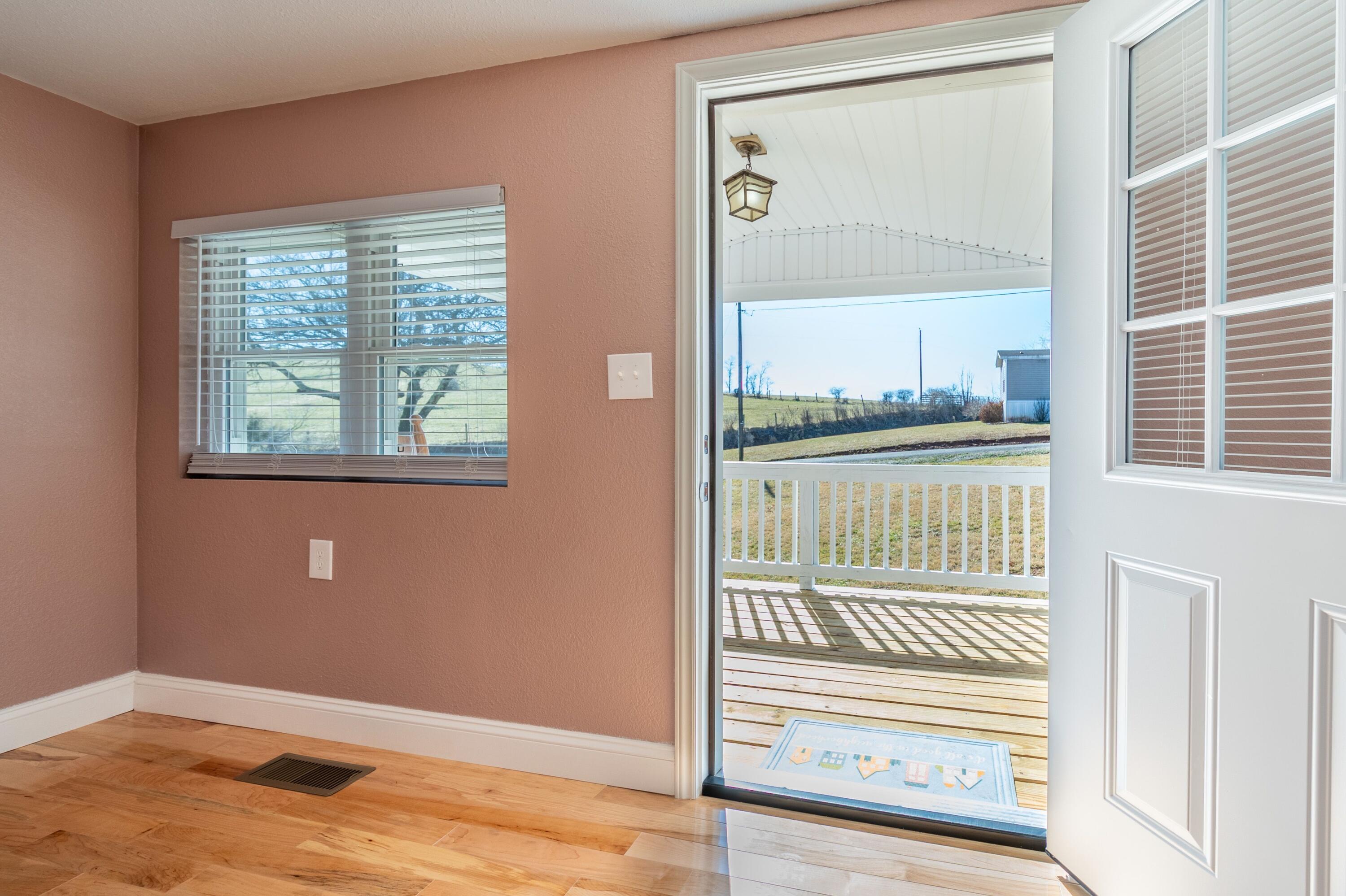 225 Mill Run Road Southwest Floyd, VA 24091 - Photo 8 of 46 a view of a room with wooden floor and a window