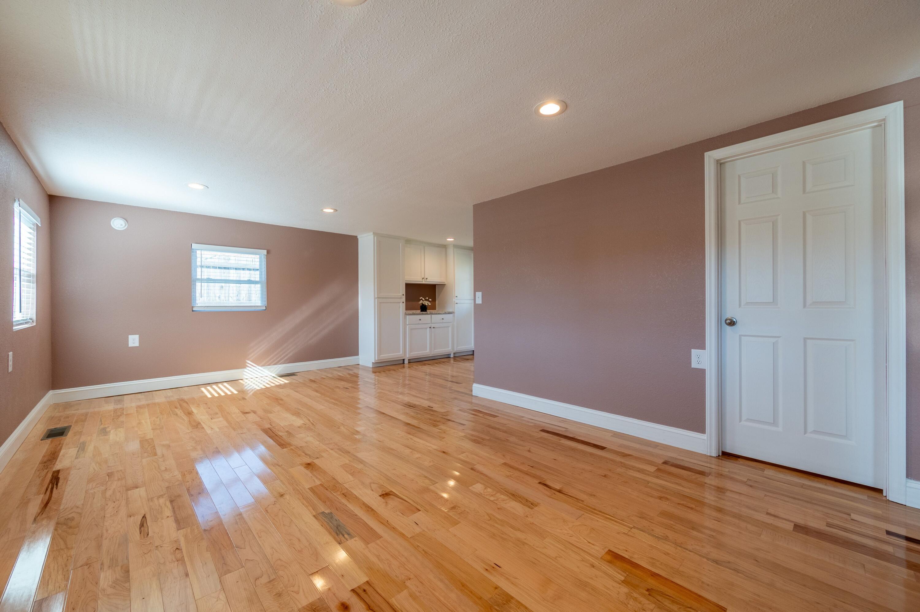225 Mill Run Road Southwest Floyd, VA 24091 - Photo 10 of 46 a view of an empty room with wooden floor and window