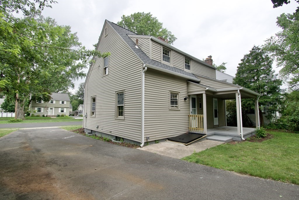 153 Gillette Avenue Springfield, MA 01118 - Photo 30 of 32 a view of a house with a yard