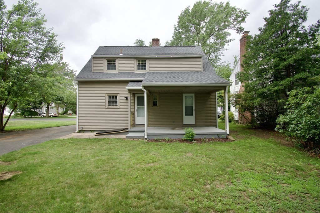 153 Gillette Avenue Springfield, MA 01118 - Photo 31 of 32 a view of a house with a yard
