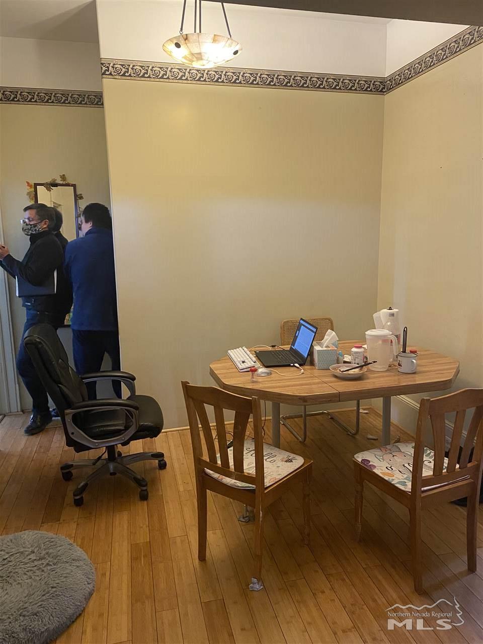 53 West 9th Street Reno, NV 89503 - Photo 13 of 33 a view of a workspace with furniture and wooden floor