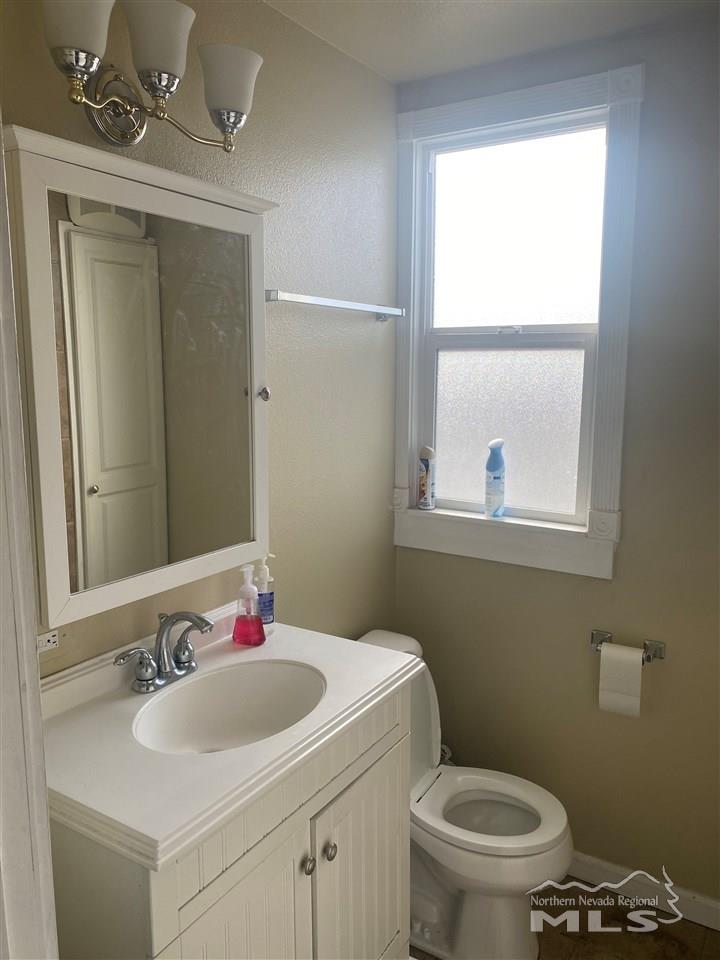 53 West 9th Street Reno, NV 89503 - Photo 20 of 33 a bathroom with a sink and a toilet