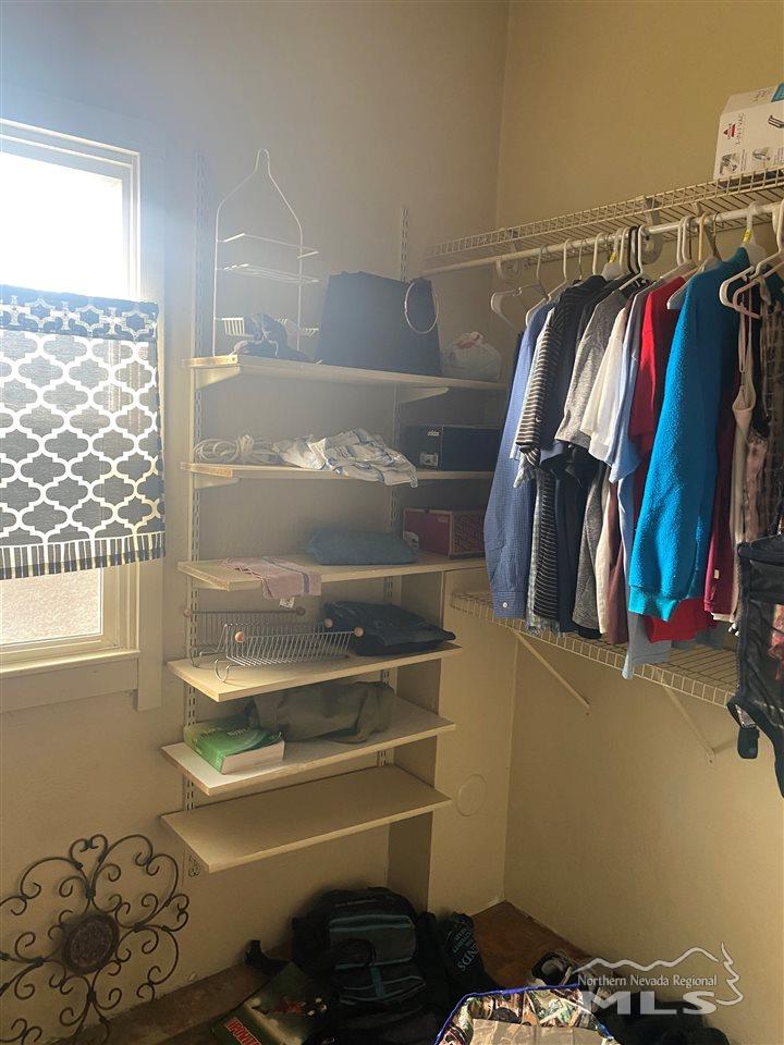 53 West 9th Street Reno, NV 89503 - Photo 25 of 33 a view of walk in closet with clothes and shoes