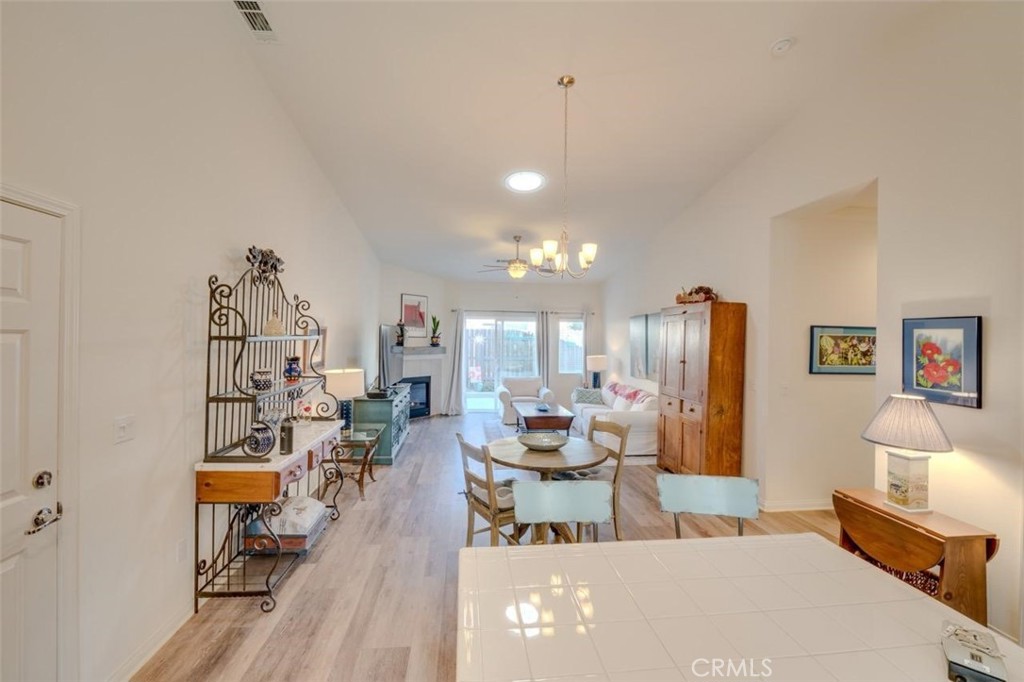 1526 South Fulton Court Santa Maria, CA 93458 - Photo 16 of 39 a living room with furniture and a wooden floor