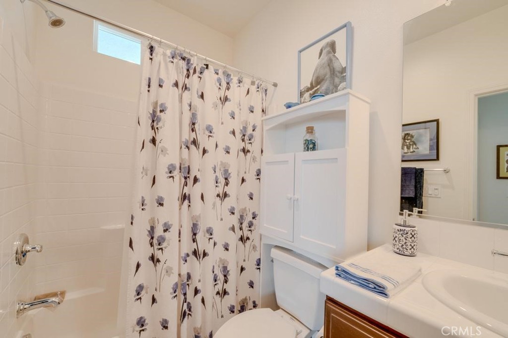 1526 South Fulton Court Santa Maria, CA 93458 - Photo 24 of 39 a bathroom with a sink toilet and shower