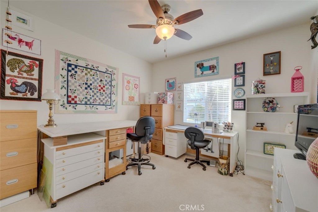 1526 South Fulton Court Santa Maria, CA 93458 - Photo 25 of 39 a view of a workspace with furniture and a window