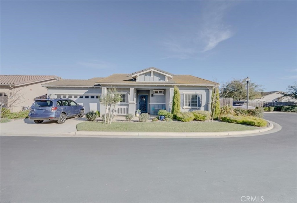 1526 South Fulton Court Santa Maria, CA 93458 - Photo 34 of 39 a front view of a house with a garden and porch