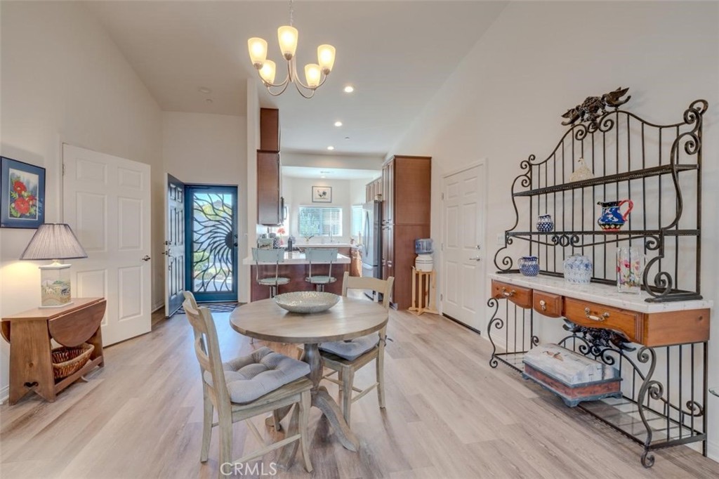 1526 South Fulton Court Santa Maria, CA 93458 - Photo 7 of 39 a view of a dining room with furniture window and wooden floor