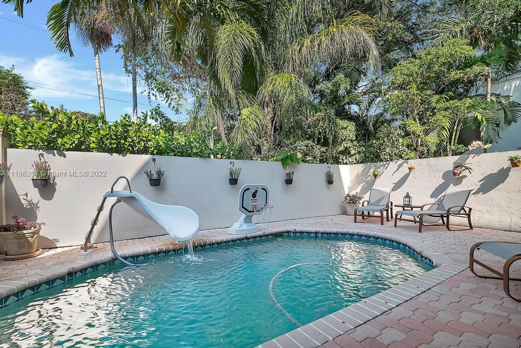 3263 Allamanda Street, Unit 3263 Miami, FL 33133 - Photo 20 of 28 an aerial view of a house having swimming pool