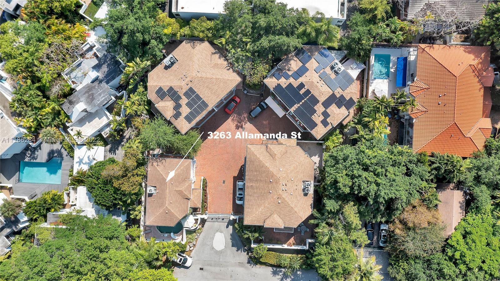 3263 Allamanda Street, Unit 3263 Miami, FL 33133 - Photo 23 of 28 an aerial view of a house