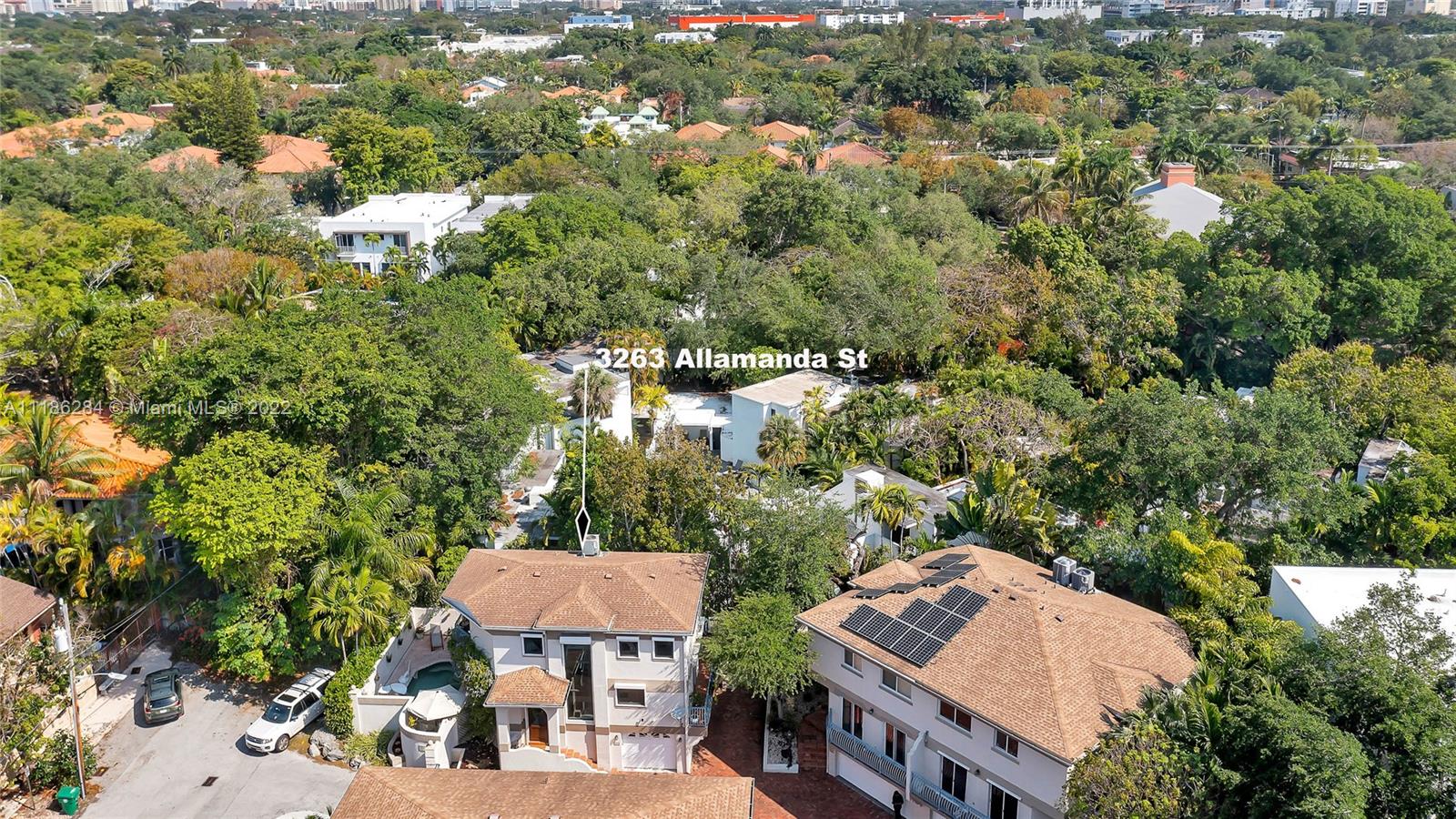 3263 Allamanda Street, Unit 3263 Miami, FL 33133 - Photo 28 of 28 an aerial view of multiple houses