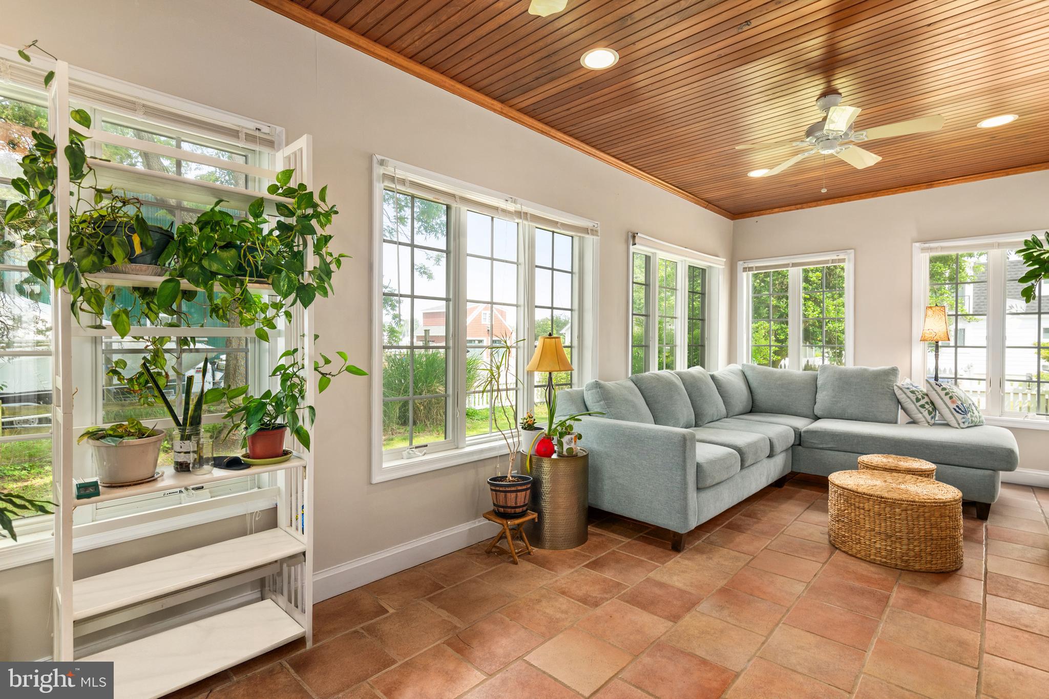 101 Sinclair Street Oxford, MD 21654 - Photo 11 of 31 a living room with furniture and a large window