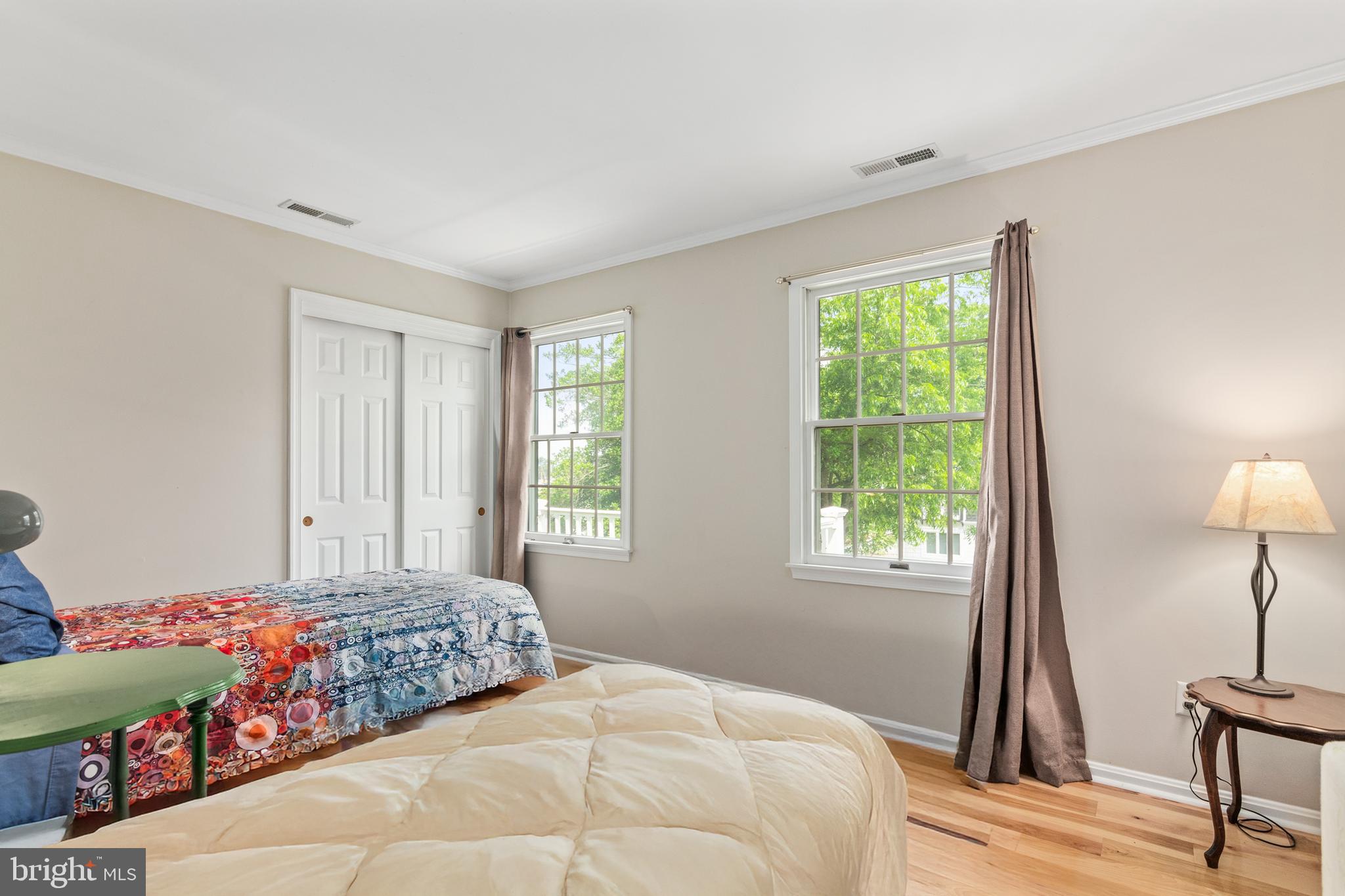 101 Sinclair Street Oxford, MD 21654 - Photo 22 of 31 a bedroom with a bed and a window