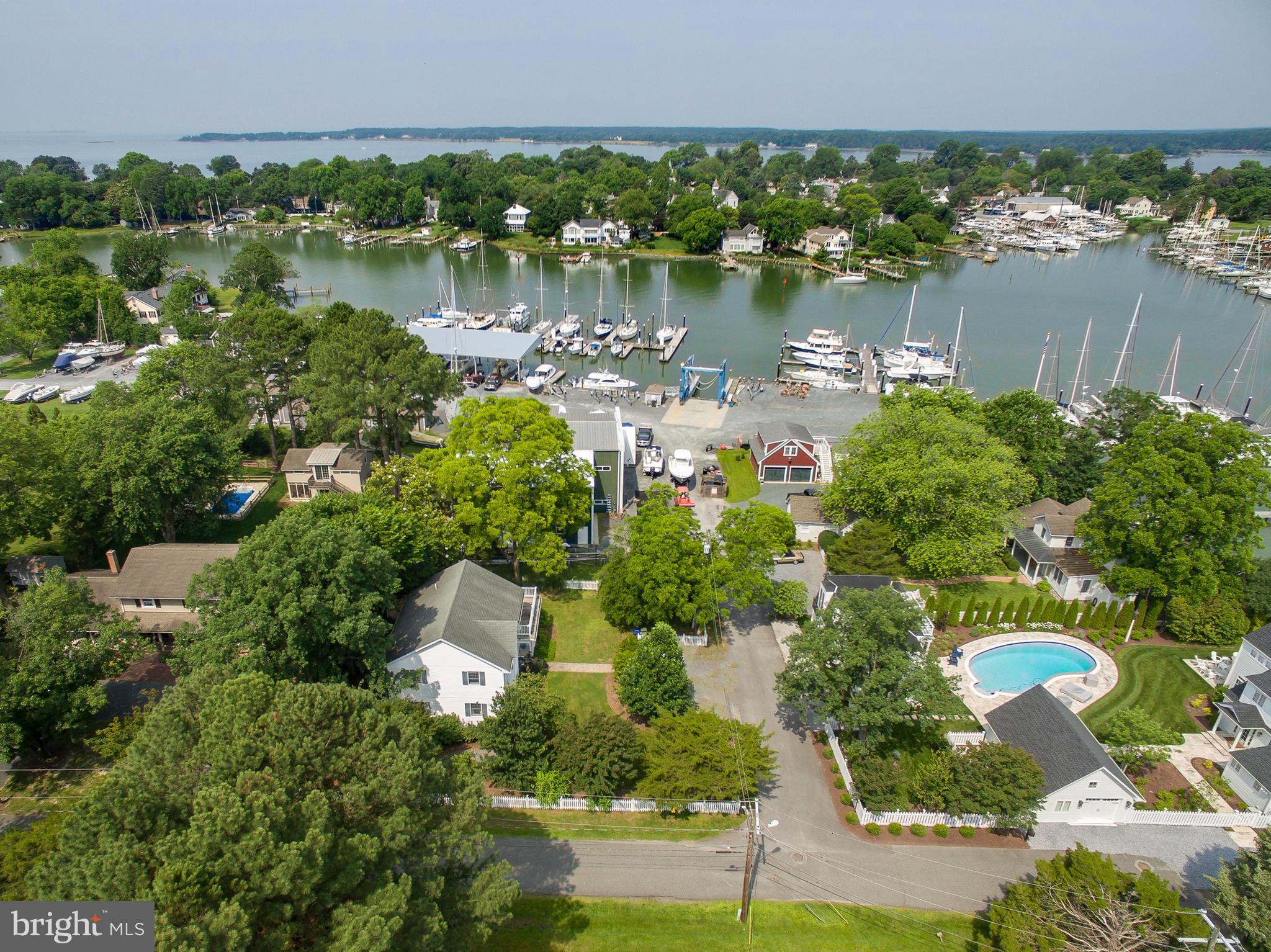 101 Sinclair Street Oxford, MD 21654 - Photo 28 of 31 an aerial view of a house with a yard and lake view