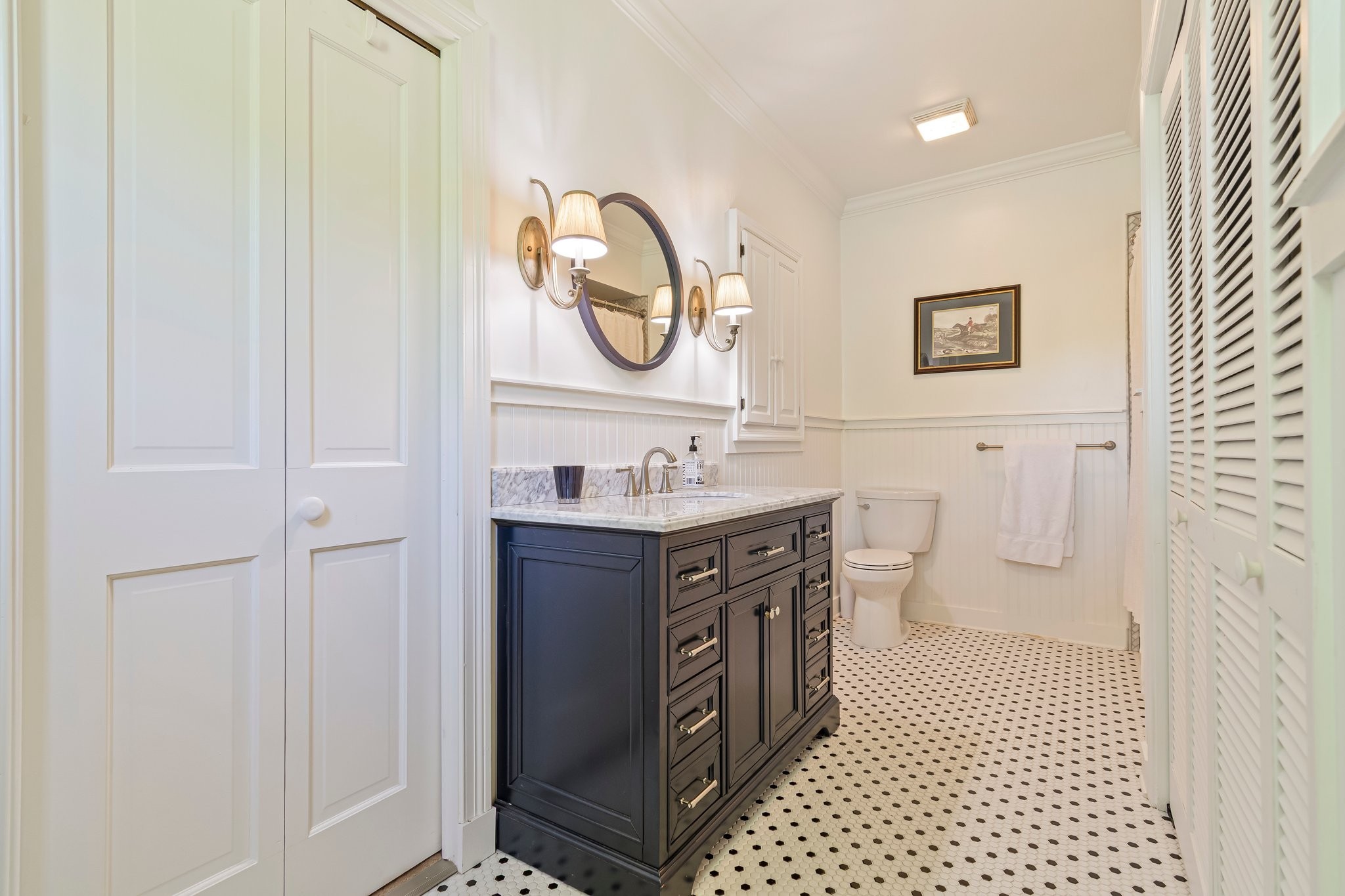 4923 Blue Creek Road Lynnville, TN 38472 - Photo 12 of 69 a bathroom with a sink a toilet and a shower