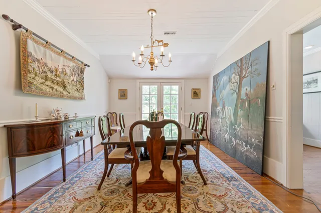 a kitchen with stainless steel appliances granite countertop a sink a stove and cabinets