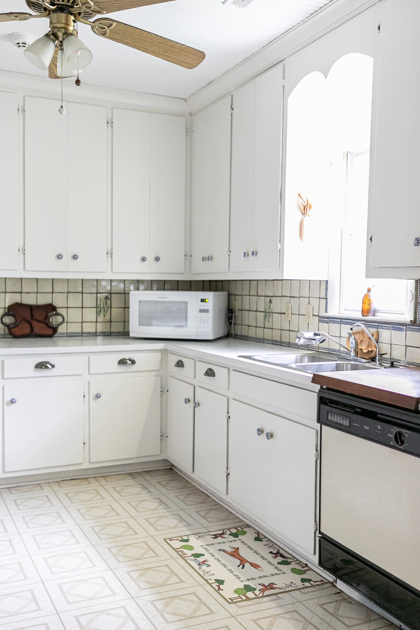4923 Blue Creek Road Lynnville, TN 38472 - Photo 34 of 69 a kitchen with stainless steel appliances granite countertop a sink a stove and cabinets