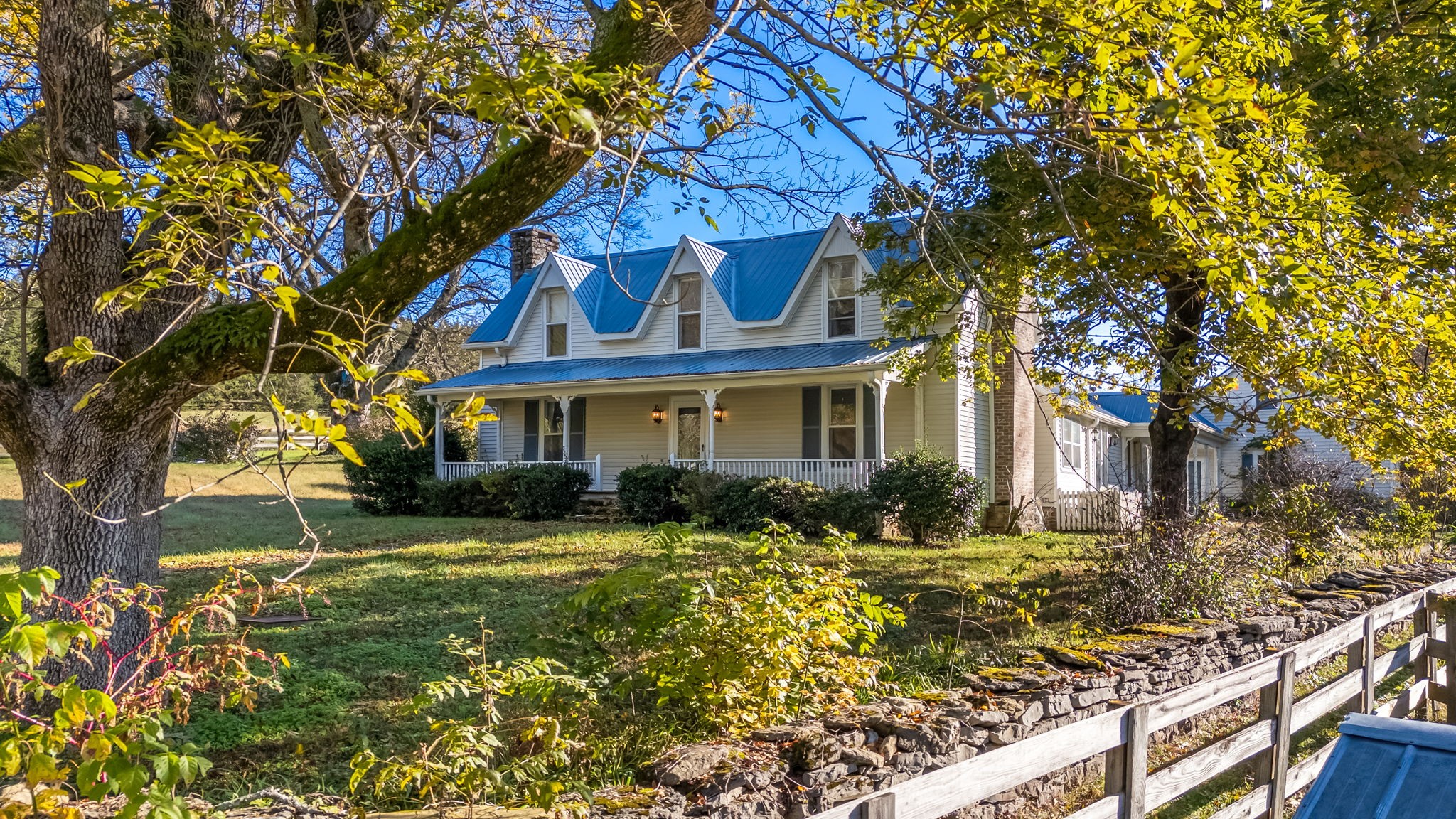 4923 Blue Creek Road Lynnville, TN 38472 - Photo 4 of 69 a front view of a house with a yard