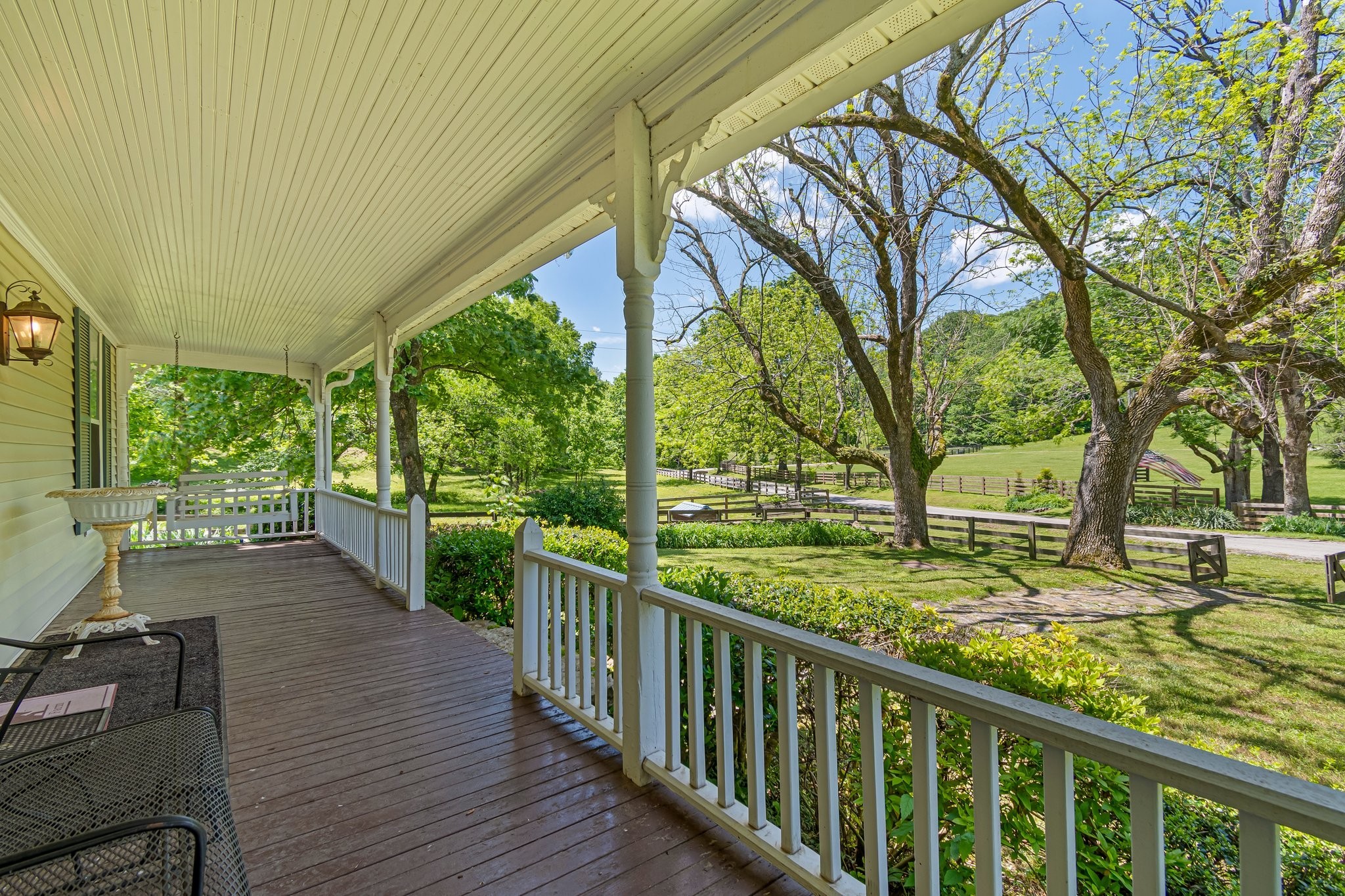 4923 Blue Creek Road Lynnville, TN 38472 - Photo 5 of 69 a view of a porch with wooden floor and fence