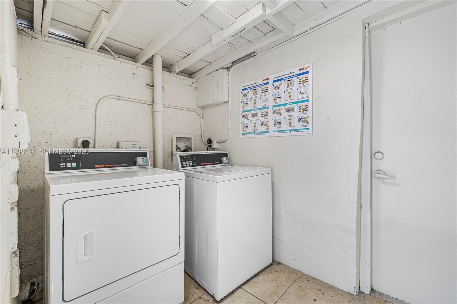577 Northeast 82nd Street, Unit 14 Miami, FL 33138 - Photo 11 of 11 a utility room with dryer and washer