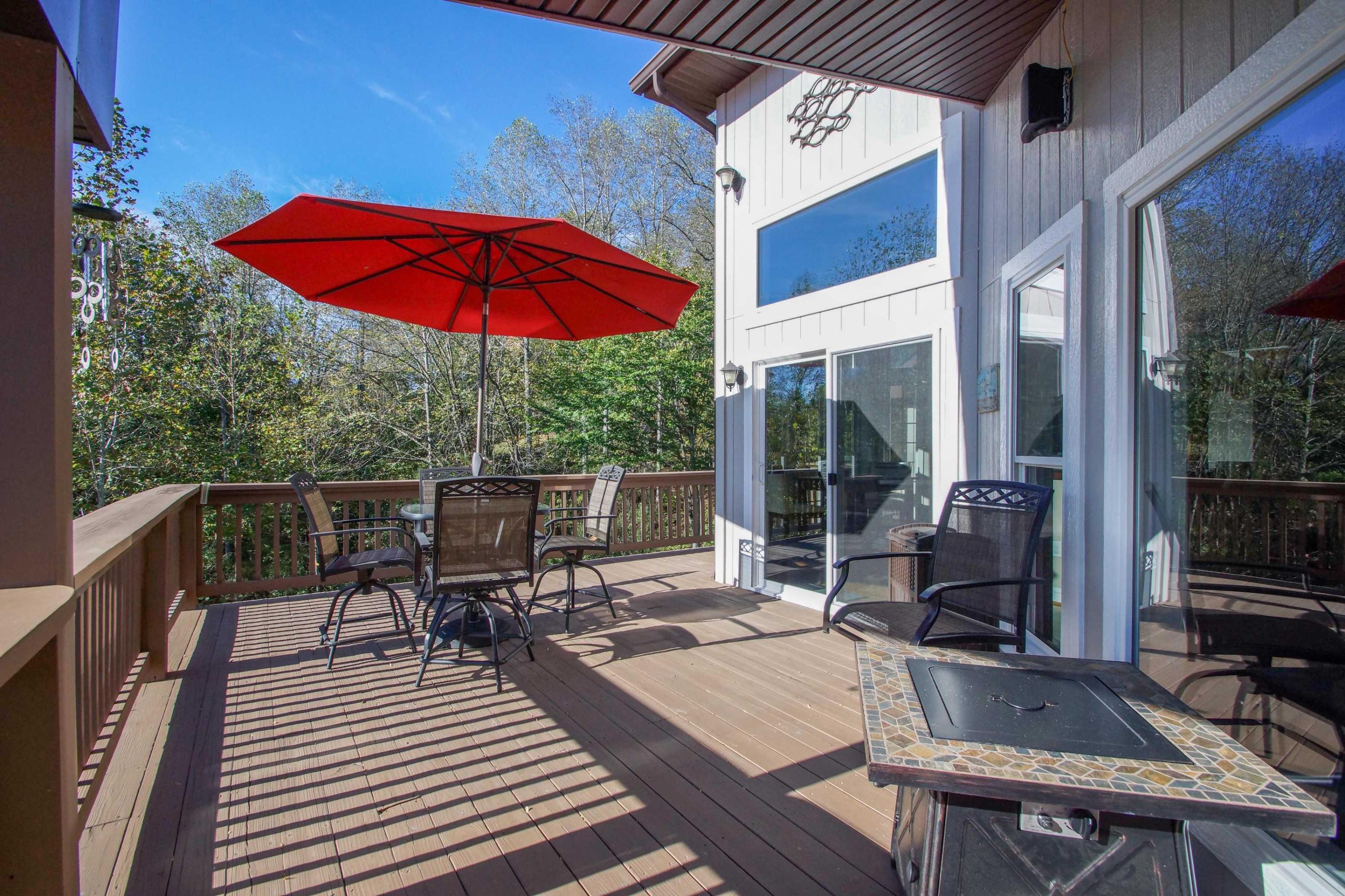 2086 Trails End Road Goodview, VA 24095 - Photo 15 of 47 a view of balcony with outdoor seating and wooden floor