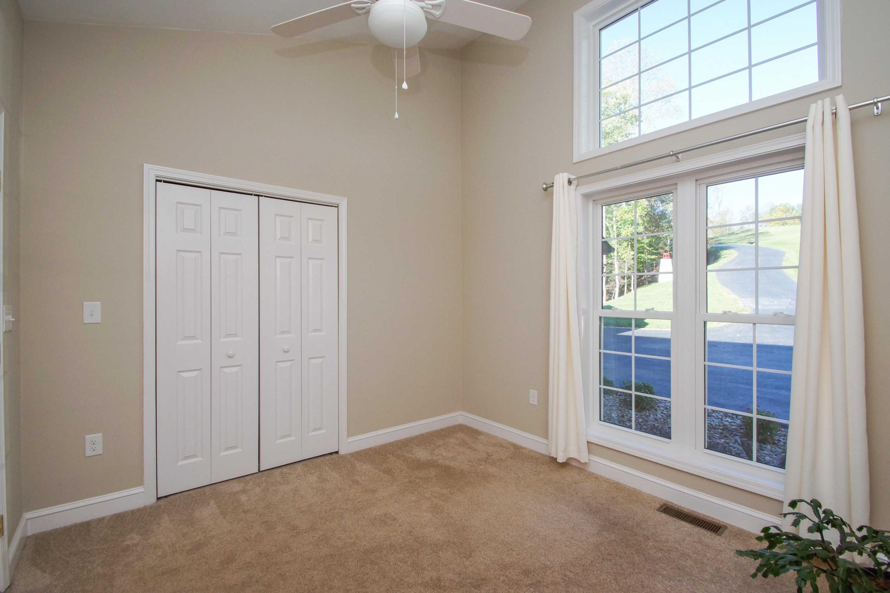 2086 Trails End Road Goodview, VA 24095 - Photo 25 of 47 an empty room with windows