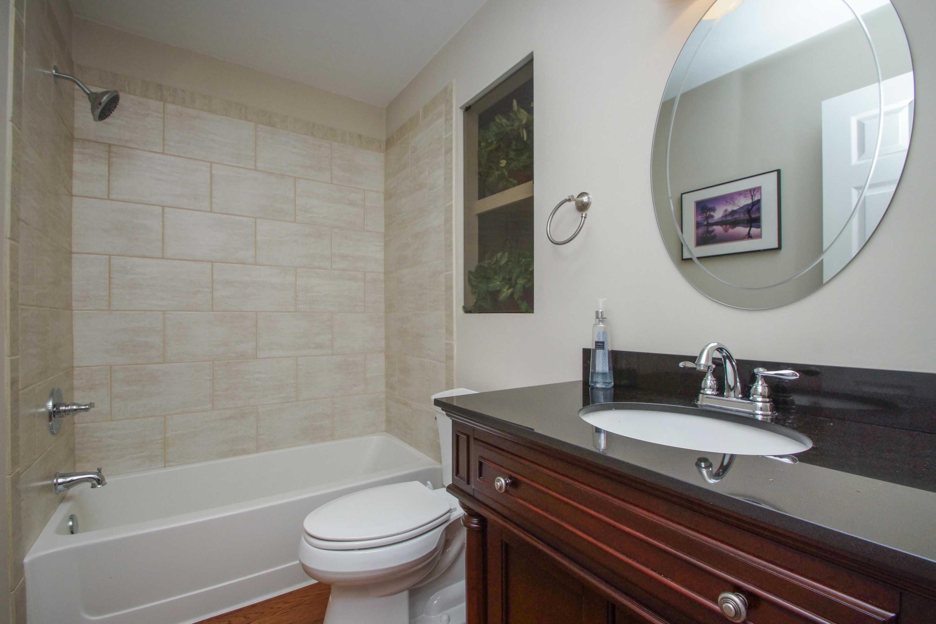 2086 Trails End Road Goodview, VA 24095 - Photo 26 of 47 a bathroom with a sink toilet and a bathtub