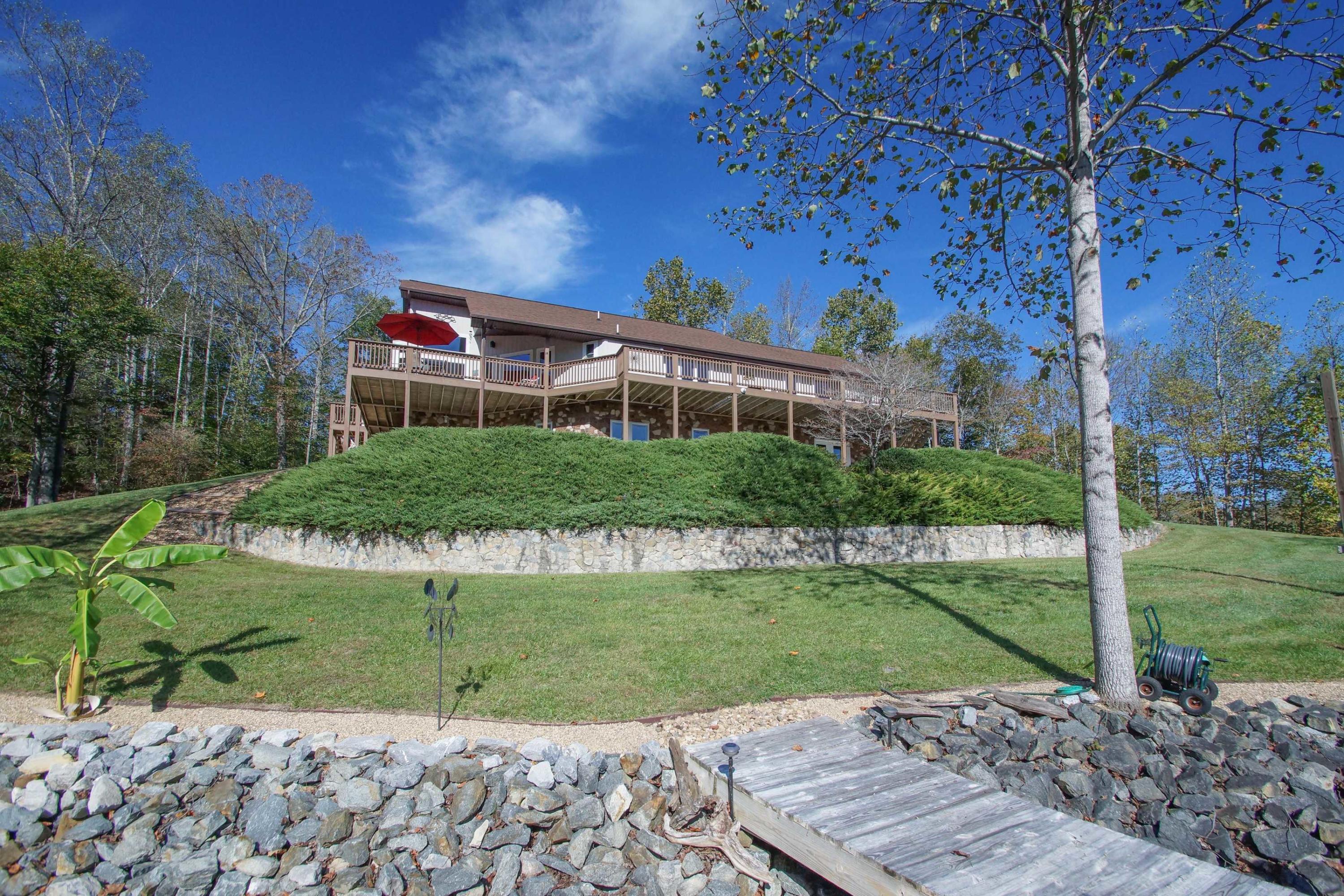 2086 Trails End Road Goodview, VA 24095 - Photo 46 of 47 a front view of a house with a yard