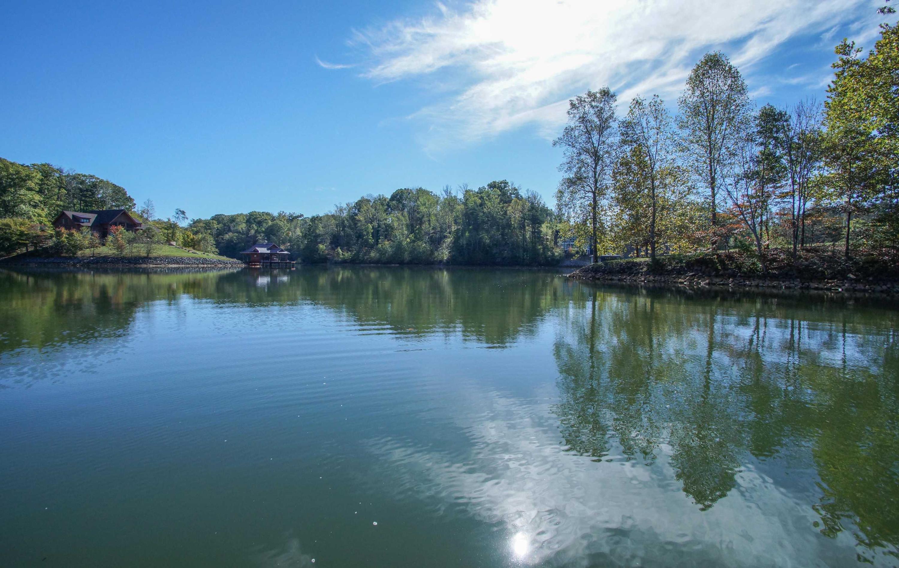 2086 Trails End Road Goodview, VA 24095 - Photo 47 of 47 a view of a lake with houses in the back