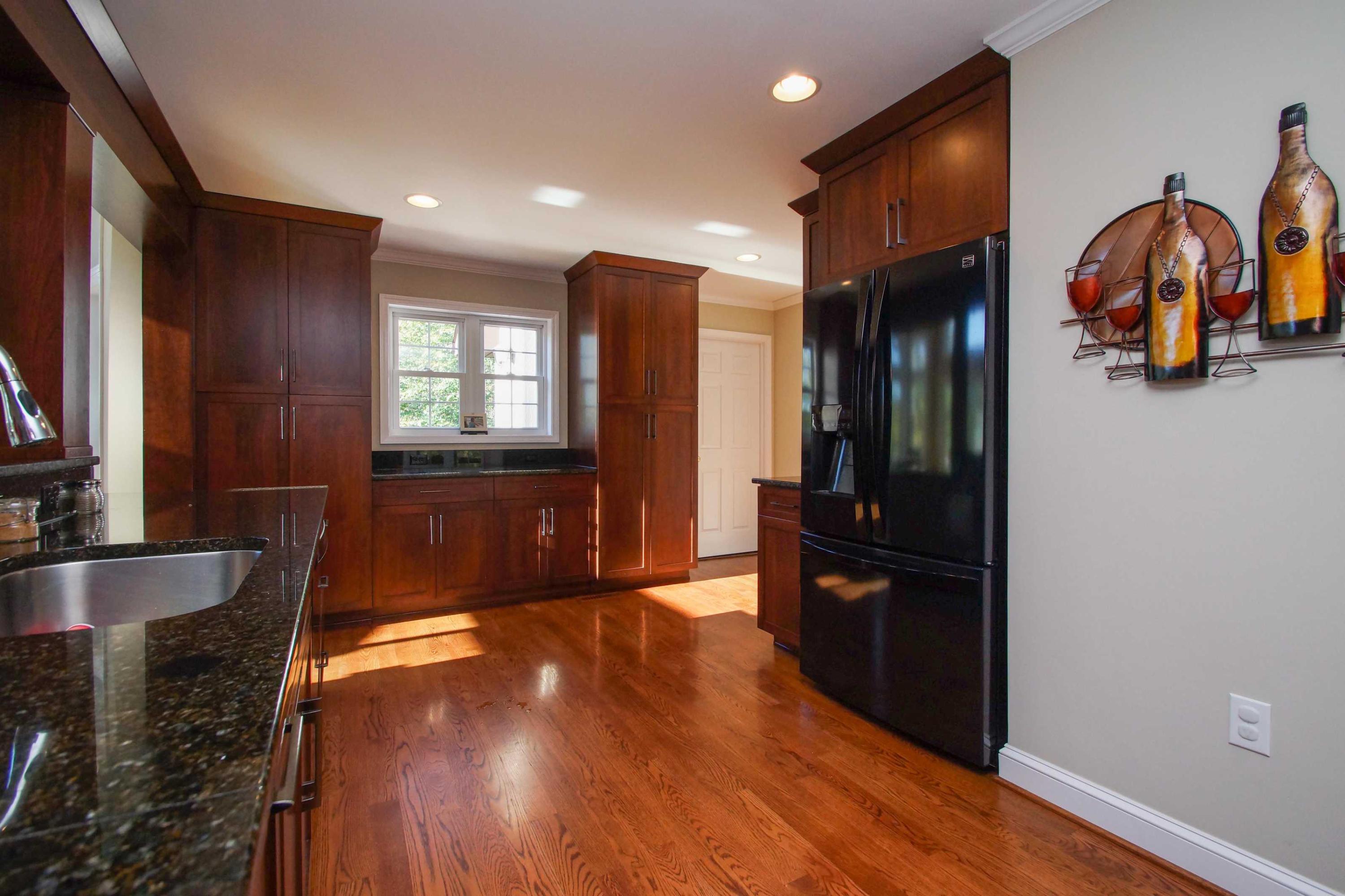 2086 Trails End Road Goodview, VA 24095 - Photo 10 of 47 a kitchen with stainless steel appliances granite countertop a refrigerator and a sink