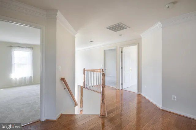 a view of a hallway with entryway