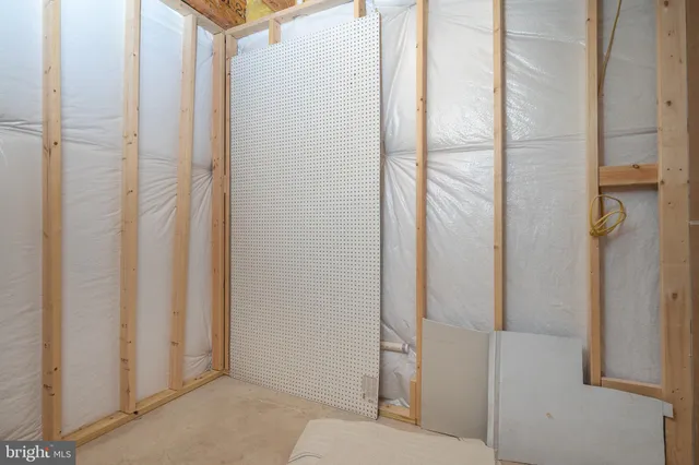a bathroom with a shower and toilet
