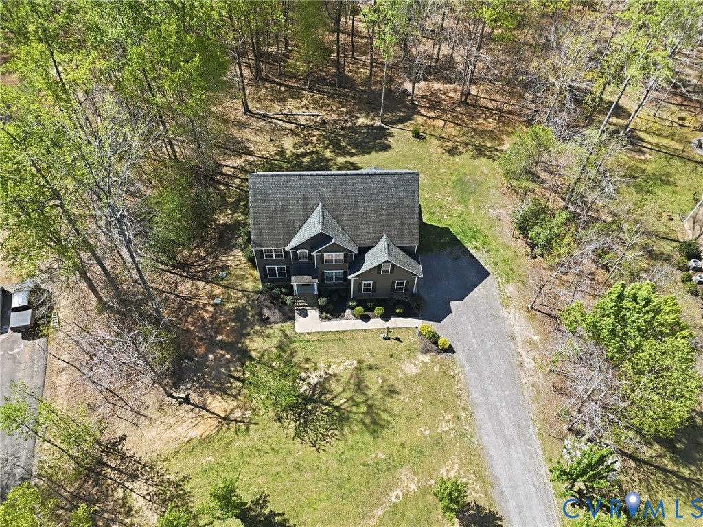 11177 Creeks Edge Road New Kent, VA 23124 - Photo 45 of 45 a view of a house with a yard and sitting area