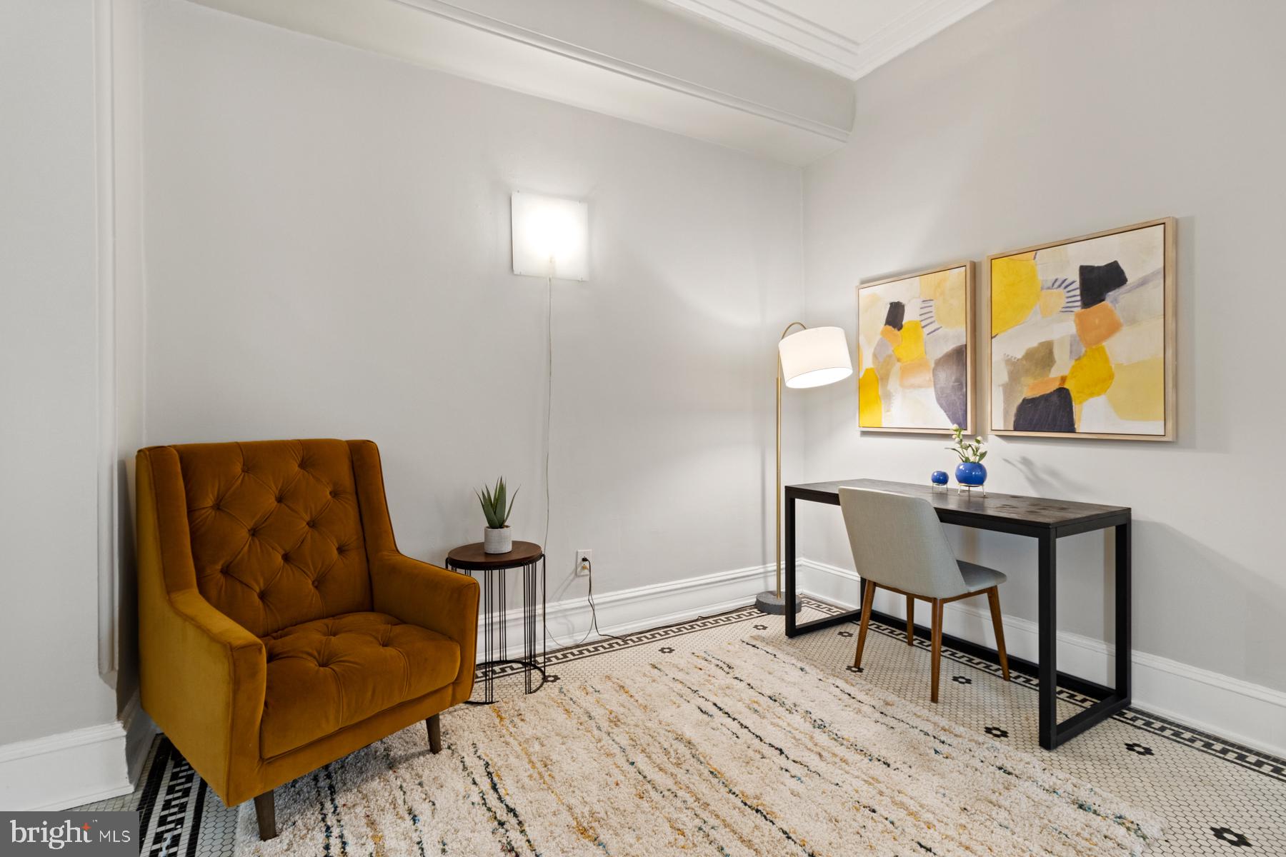 3420 16th Street Northwest, Unit 101 Washington, DC 20010 - Photo 13 of 29 a living room with furniture and a wooden floor