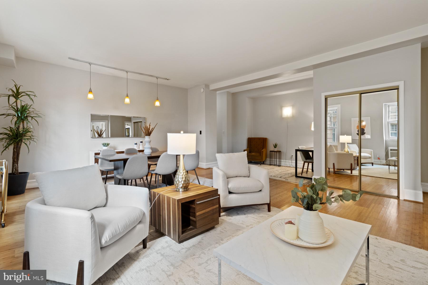 3420 16th Street Northwest, Unit 101 Washington, DC 20010 - Photo 22 of 29 a living room with furniture and a wooden floor