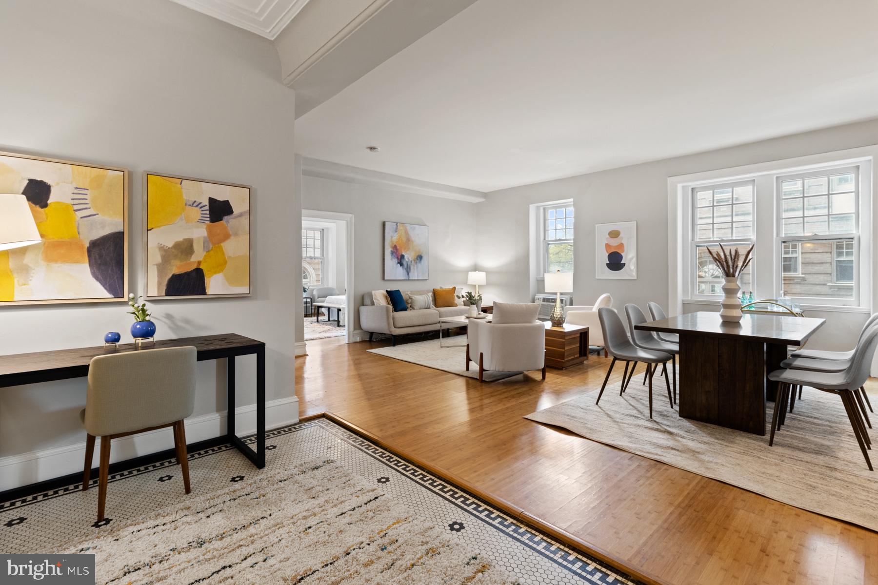 3420 16th Street Northwest, Unit 101 Washington, DC 20010 - Photo 23 of 29 a living room with fireplace furniture and a table