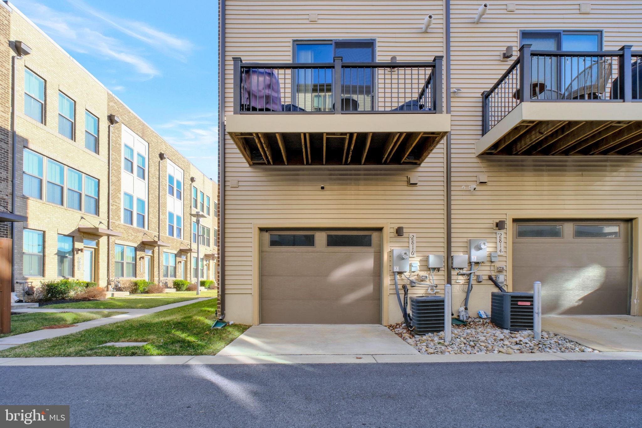 3420 16th Street Northwest, Unit 101 Washington, DC 20010 - Photo 26 of 29 a view of a brick house with many windows