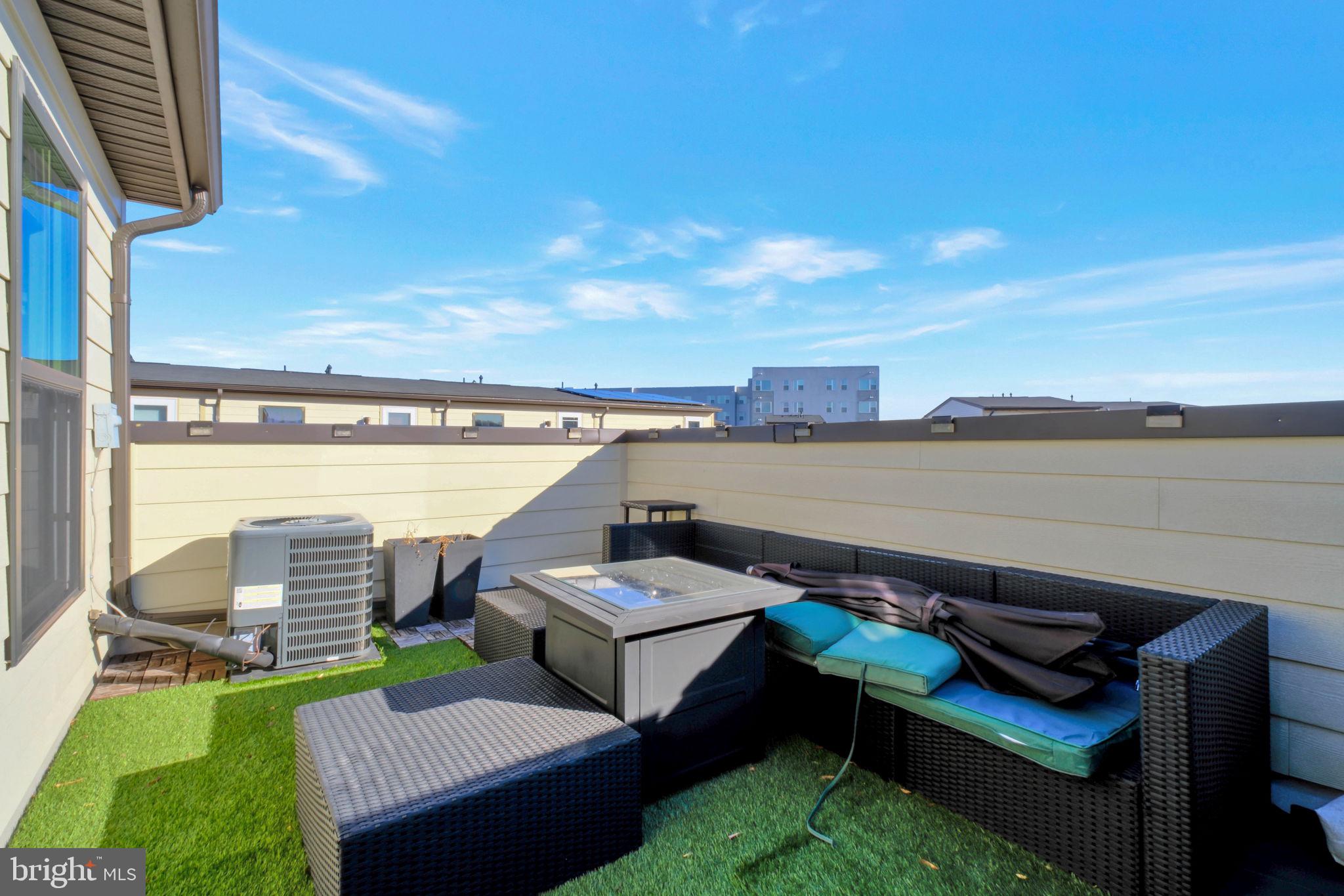 3420 16th Street Northwest, Unit 101 Washington, DC 20010 - Photo 29 of 29 a view of a balcony with chairs
