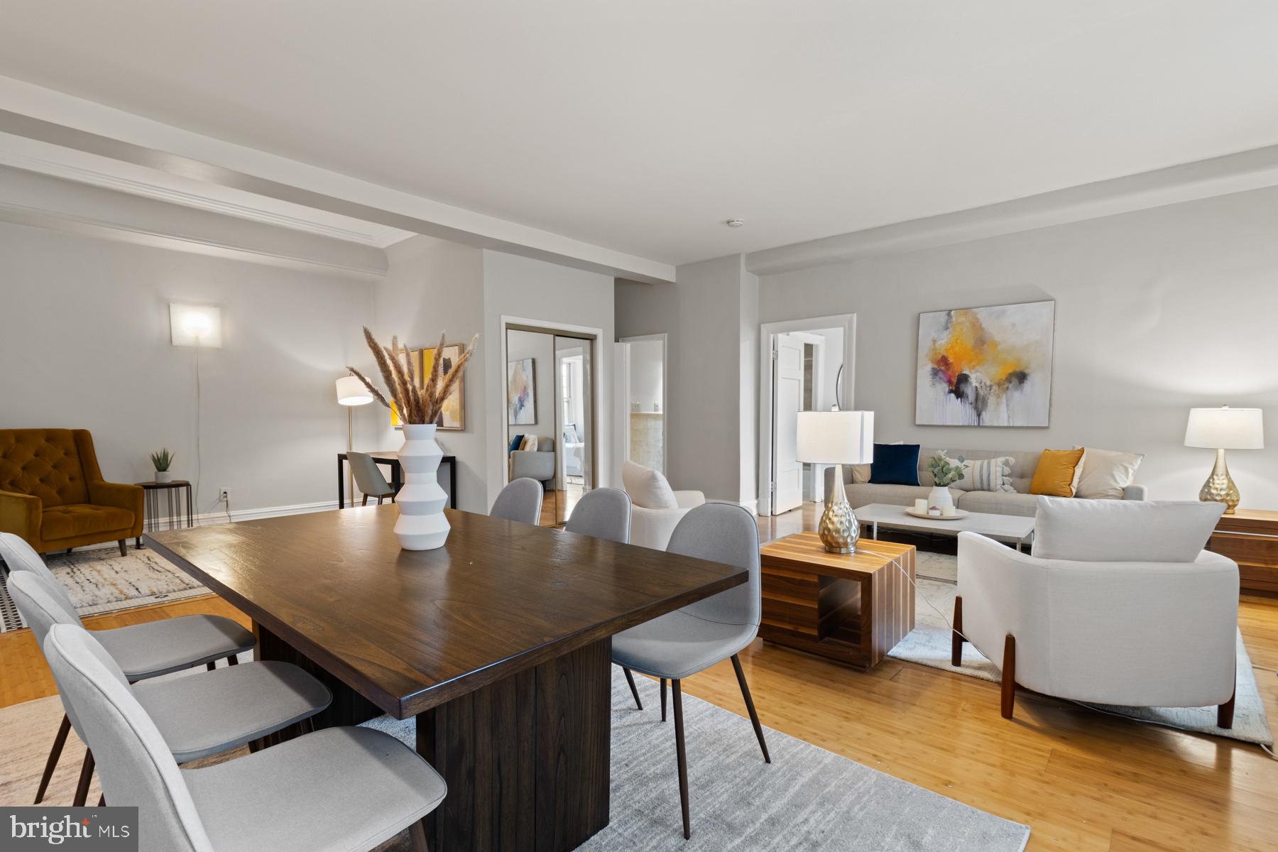 3420 16th Street Northwest, Unit 101 Washington, DC 20010 - Photo 8 of 29 a view of a dining room with furniture and wooden floor