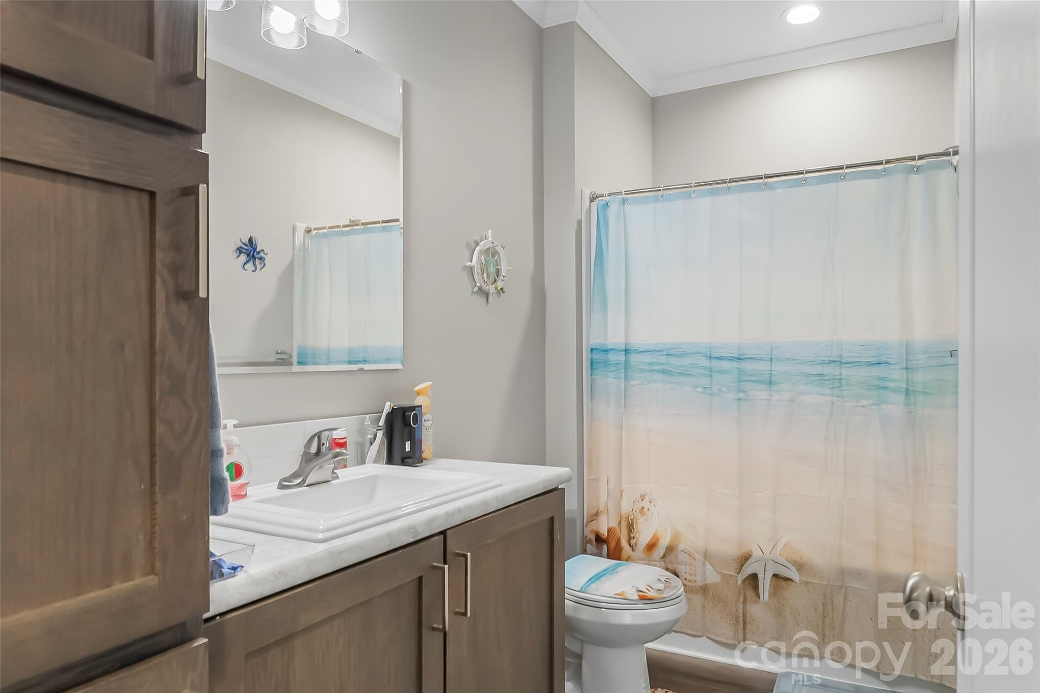 3511 Randleman Road Iron Station, NC 28080 - Photo 21 of 31 a bathroom with a granite countertop sink toilet and shower