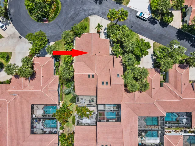 a living room with furniture ceiling fan and a rug